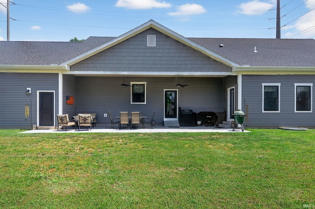 1229 Corby Blvd, South Bend, IN 46617 - rear view of house with a ceiling fan, a lawn, a patio, and a shingled roof