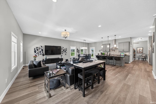 1229 Corby Blvd, South Bend, IN 46617 - living room featuring light wood-style flooring and recessed lighting