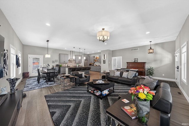 1229 Corby Blvd, South Bend, IN 46617 - living area featuring light wood-style floors and recessed lighting