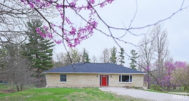 348 Arthur Rd, Springville, IN 47462 - single story home featuring stone siding, a front lawn, and gravel driveway