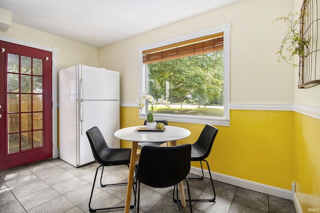 19545 Hildebrand St, South Bend, IN 46614 - tiled dining area featuring healthy amount of natural light