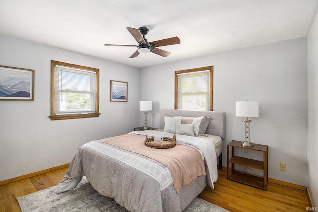 19545 Hildebrand St, South Bend, IN 46614 - bedroom featuring light wood-style flooring and a ceiling fan