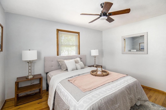 19545 Hildebrand St, South Bend, IN 46614 - bedroom featuring light wood-style floors and a ceiling fan