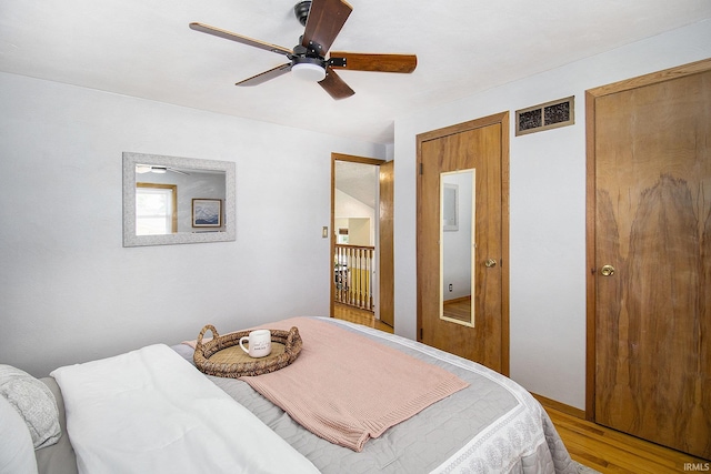 19545 Hildebrand St, South Bend, IN 46614 - bedroom featuring wood finished floors and ceiling fan