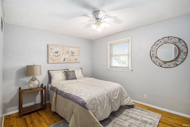 19545 Hildebrand St, South Bend, IN 46614 - bedroom with wood finished floors and ceiling fan