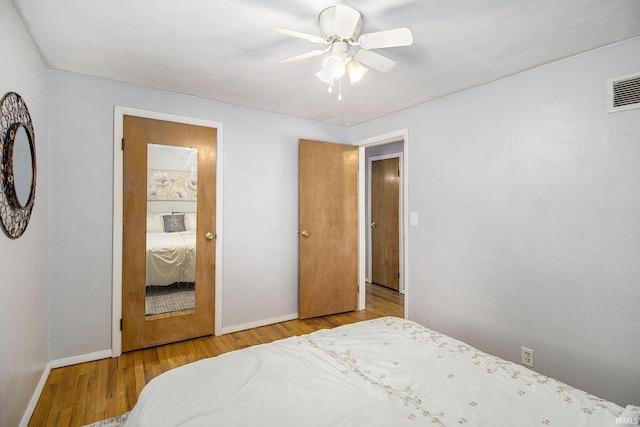 19545 Hildebrand St, South Bend, IN 46614 - bedroom with wood finished floors and ceiling fan