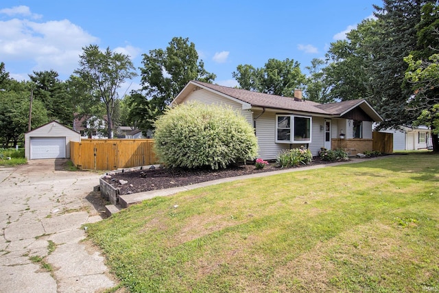 19545 Hildebrand St, South Bend, IN 46614 - view of front of home featuring an outbuilding, driveway, a garage, a chimney, and a shingled roof