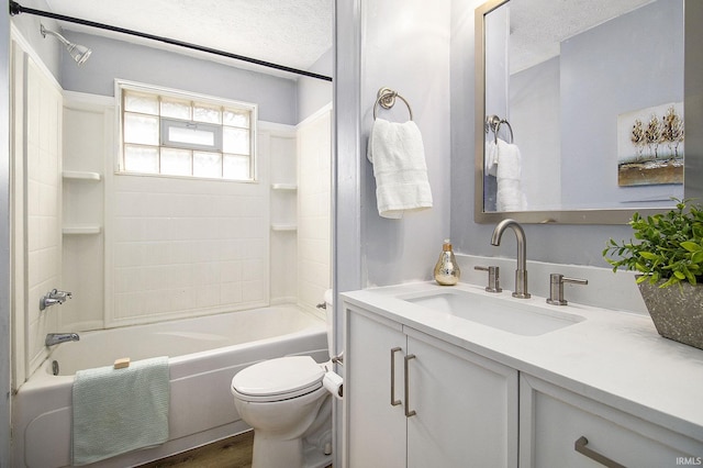 19545 Hildebrand St, South Bend, IN 46614 - bathroom featuring vanity, bathing tub / shower combination, and a textured ceiling