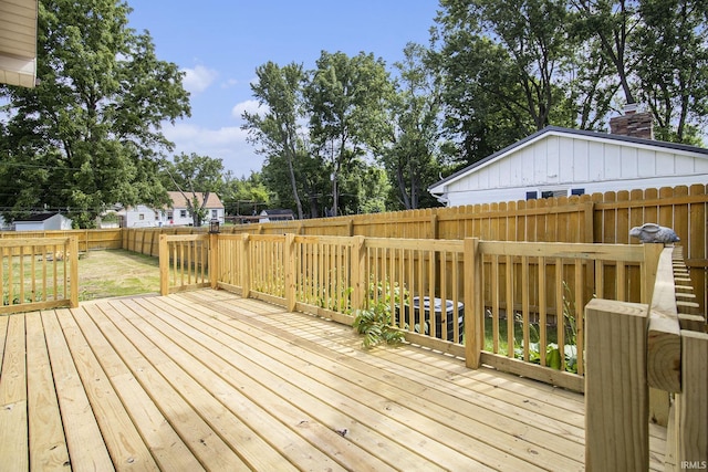 19545 Hildebrand St, South Bend, IN 46614 - wooden deck with a fenced backyard