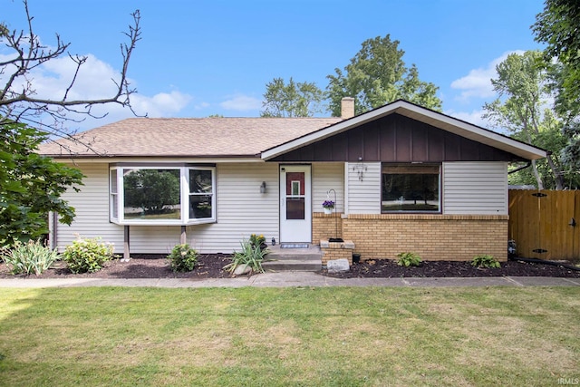19545 Hildebrand St, South Bend, IN 46614 - ranch-style home featuring brick siding, a chimney, and a shingled roof