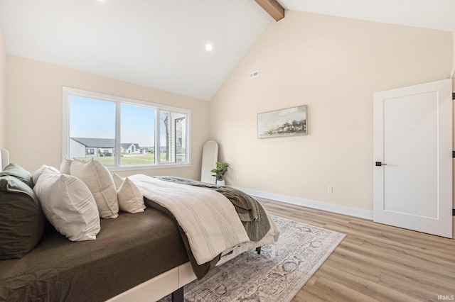 17882 Pavia Pass, Huntertown, IN 46748 - bedroom with beam ceiling, light wood-style flooring, high vaulted ceiling, and recessed lighting