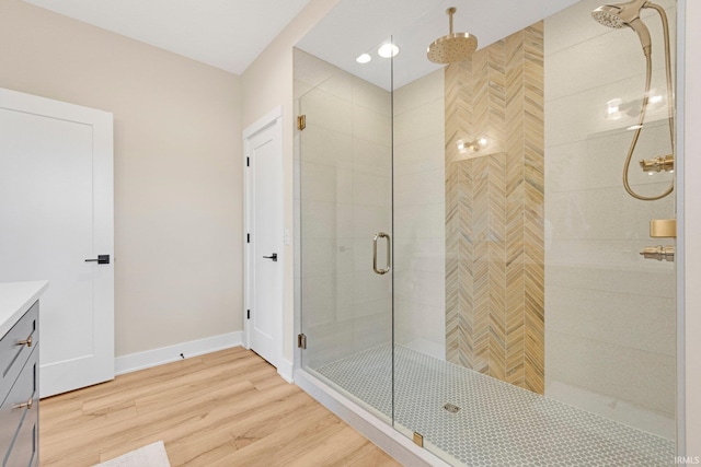 17882 Pavia Pass, Huntertown, IN 46748 - full bath with a stall shower, vanity, and wood finished floors