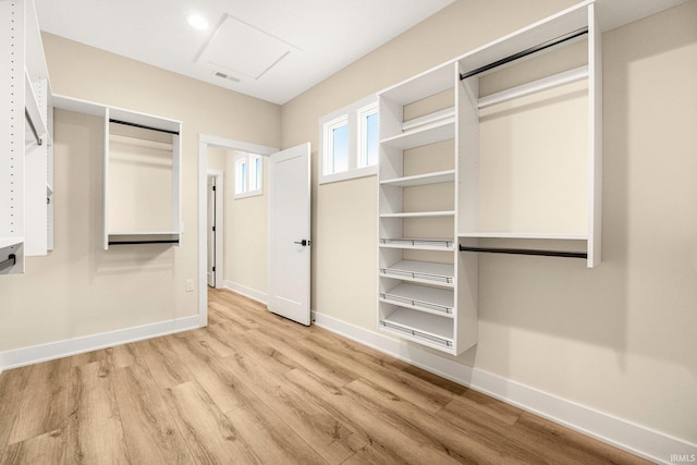 17882 Pavia Pass, Huntertown, IN 46748 - walk in closet featuring light wood-type flooring
