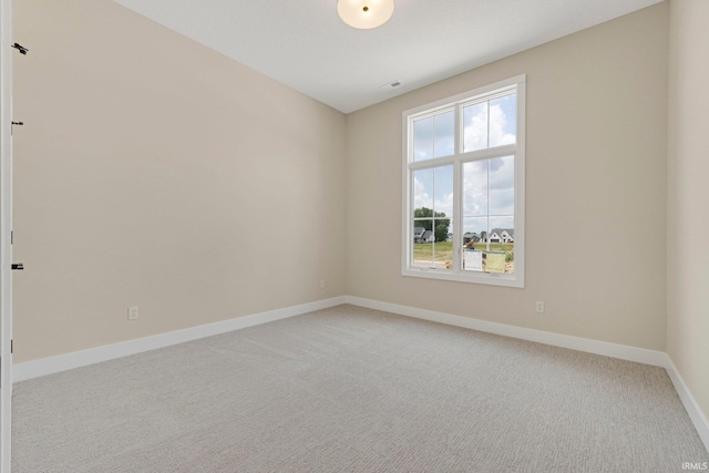 17882 Pavia Pass, Huntertown, IN 46748 - unfurnished room featuring light carpet and baseboards