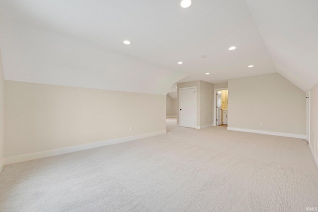 17882 Pavia Pass, Huntertown, IN 46748 - additional living space featuring vaulted ceiling, light carpet, and recessed lighting