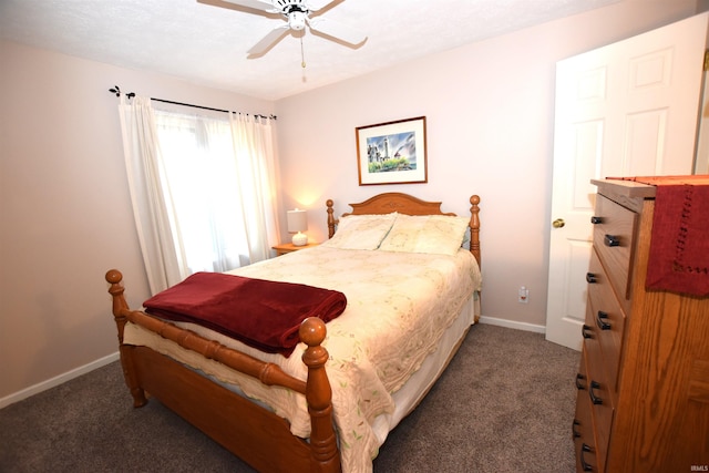 9841 S Harbour Pointe Dr, Bloomington, IN 47401 - carpeted bedroom with baseboards and ceiling fan