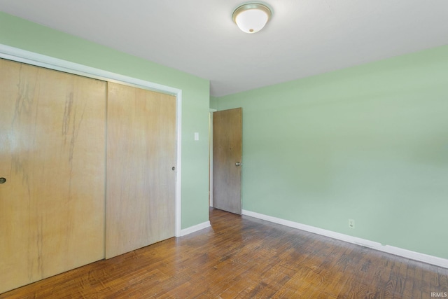 23099 Gardena Pl, Elkhart, IN 46514 - unfurnished bedroom with a closet and wood finished floors
