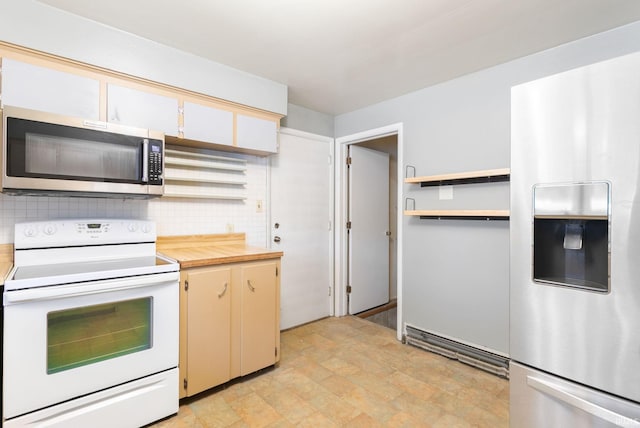 23099 Gardena Pl, Elkhart, IN 46514 - kitchen with stainless steel appliances, backsplash, light countertops, stone finish floors, and open shelves