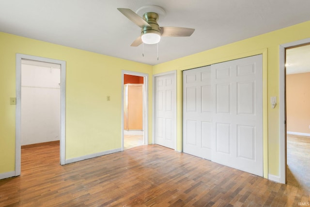23099 Gardena Pl, Elkhart, IN 46514 - unfurnished bedroom featuring wood finished floors and a ceiling fan