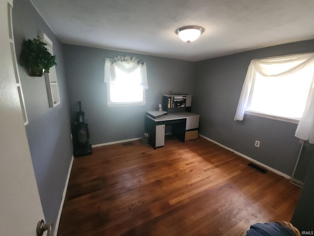 803 Stanley St, Logansport, IN 46947 - office area with plenty of natural light and wood finished floors