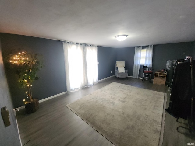 803 Stanley St, Logansport, IN 46947 - sitting room with wood finished floors and baseboards
