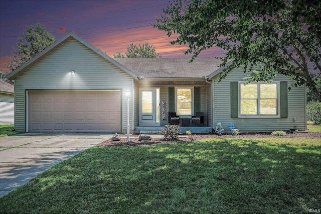23200 S Oakleaf Dr, Elkhart, IN 46514 - single story home featuring a porch, concrete driveway, an attached garage, a lawn, and roof with shingles