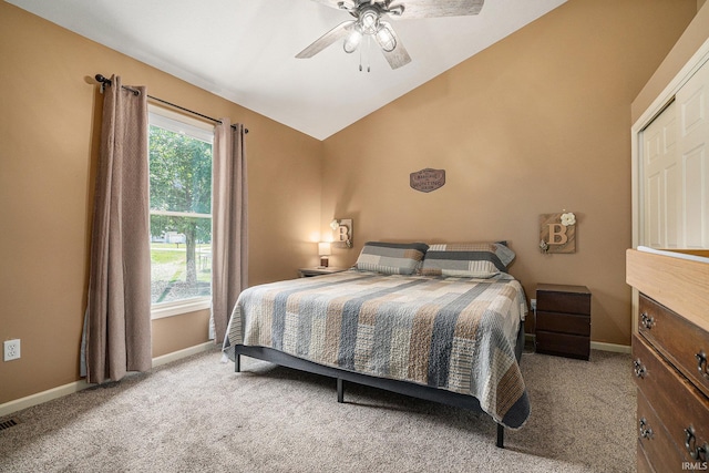 23200 S Oakleaf Dr, Elkhart, IN 46514 - bedroom with light colored carpet, vaulted ceiling, and a ceiling fan