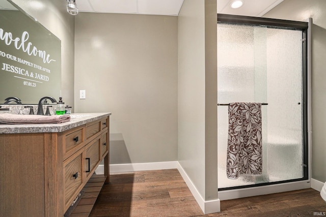 23200 S Oakleaf Dr, Elkhart, IN 46514 - full bathroom featuring vanity, wood finished floors, and a shower
