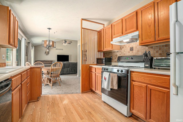 23200 S Oakleaf Dr, Elkhart, IN 46514 - kitchen featuring stainless steel appliances, under cabinet range hood, ceiling fan, light wood finished floors, and light countertops