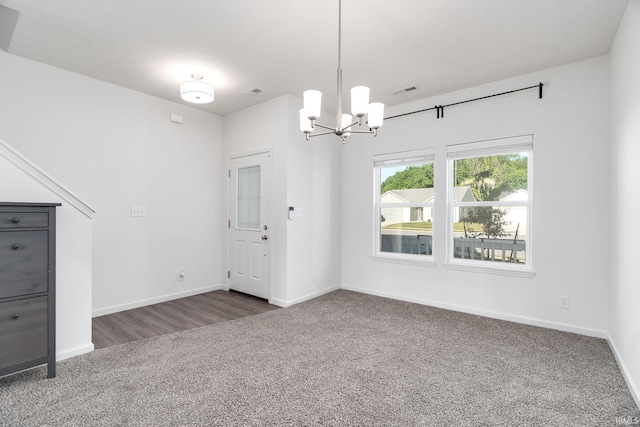 197 Folkston Way, Lafayette, IN 47905 - unfurnished dining area featuring carpet flooring and a chandelier