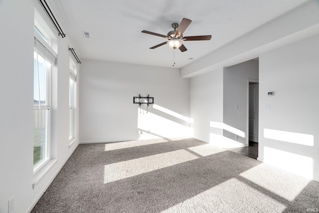 197 Folkston Way, Lafayette, IN 47905 - unfurnished room with carpet flooring, ceiling fan, and healthy amount of natural light