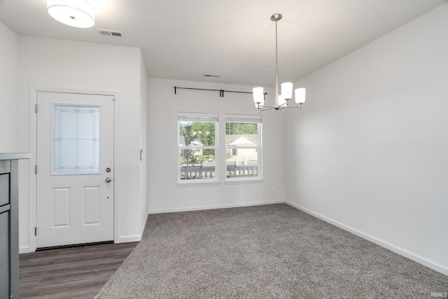197 Folkston Way, Lafayette, IN 47905 - unfurnished dining area featuring a chandelier and baseboards
