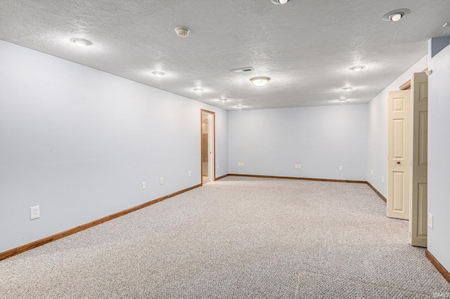 4211 Anchor Dr, Mishawaka, IN 46544 - below grade area featuring light carpet and a textured ceiling