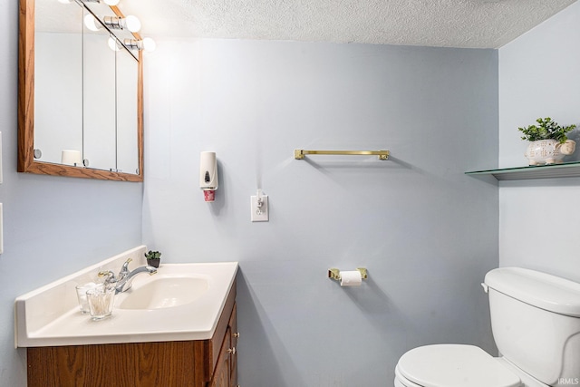 4211 Anchor Dr, Mishawaka, IN 46544 - bathroom featuring a textured ceiling and vanity