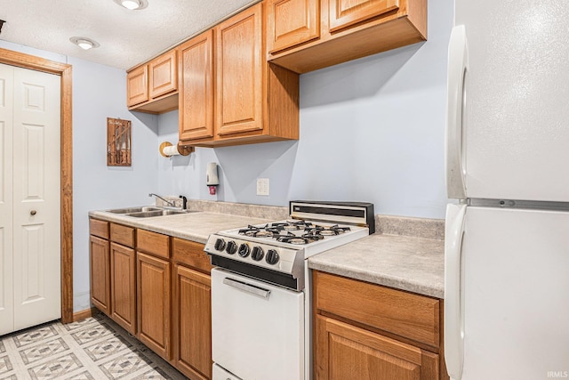 4211 Anchor Dr, Mishawaka, IN 46544 - kitchen with white appliances, light countertops, and a textured ceiling