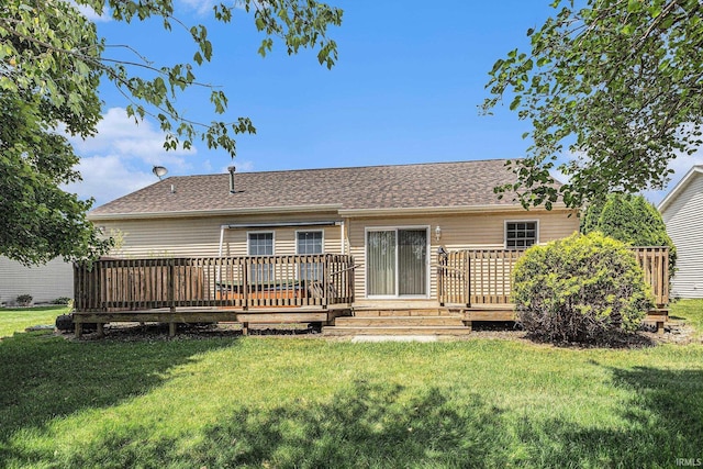 4211 Anchor Dr, Mishawaka, IN 46544 - rear view of property featuring a deck, a lawn, and roof with shingles