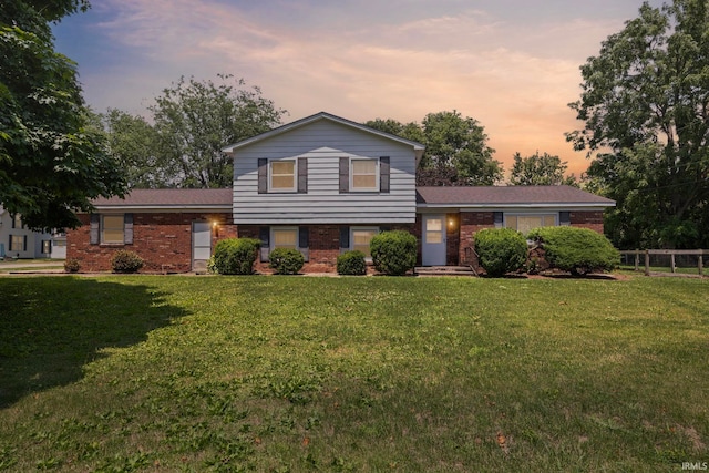 303 N Center St, Boswell, IN 47921 - tri-level home featuring brick siding