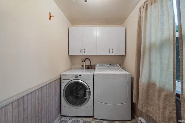 303 N Center St, Boswell, IN 47921 - laundry room featuring washing machine and clothes dryer, cabinet space, wainscoting, and wooden walls