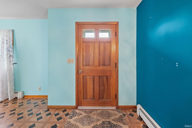 303 N Center St, Boswell, IN 47921 - foyer entrance featuring a baseboard radiator and a baseboard heating unit