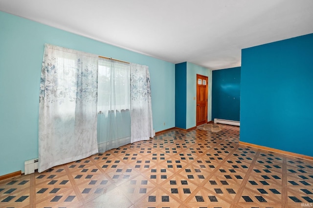 303 N Center St, Boswell, IN 47921 - empty room featuring baseboard heating