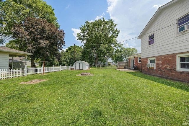303 N Center St, Boswell, IN 47921 - fenced backyard with a storage shed, cooling unit, and a patio