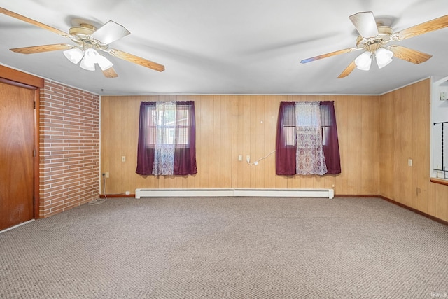 303 N Center St, Boswell, IN 47921 - unfurnished room featuring ceiling fan, carpet floors, a baseboard heating unit, and wood walls