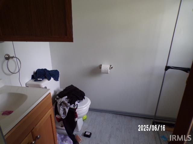 2401 S Selby St, Marion, IN 46953 - bathroom with vanity and toilet