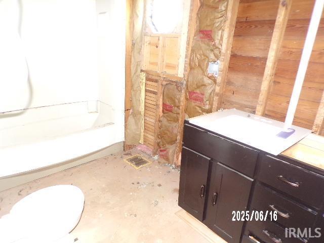 2401 S Selby St, Marion, IN 46953 - full bath with vanity and wood walls