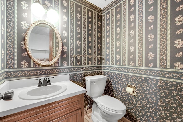 5610 E State Blvd, Fort Wayne, IN 46815 - half bath with vanity and wallpapered walls