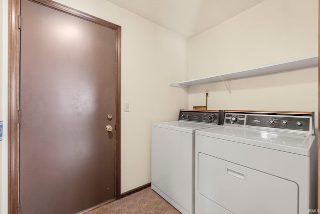 5610 E State Blvd, Fort Wayne, IN 46815 - washroom featuring washing machine and clothes dryer and light carpet