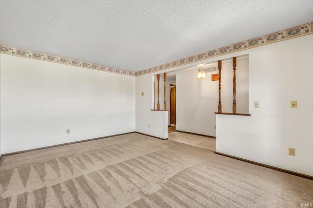 5610 E State Blvd, Fort Wayne, IN 46815 - unfurnished room featuring carpet and a textured ceiling