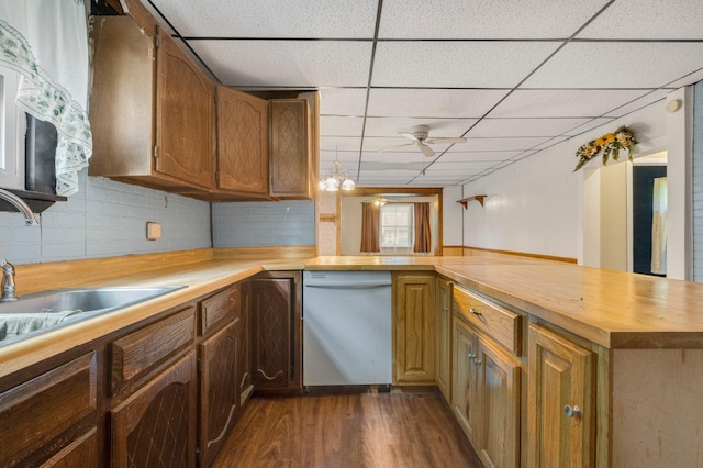 408 E Main St, Butler, IN 46721 - kitchen featuring white dishwasher, a drop ceiling, butcher block countertops, a ceiling fan, and dark wood-type flooring