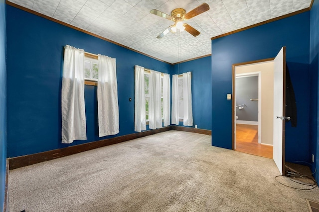 408 E Main St, Butler, IN 46721 - unfurnished bedroom with carpet flooring, ceiling fan, and ornamental molding