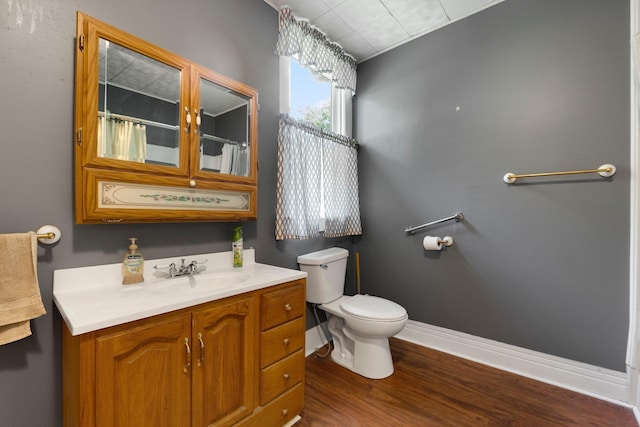 408 E Main St, Butler, IN 46721 - bathroom with wood finished floors, vanity, and curtained shower